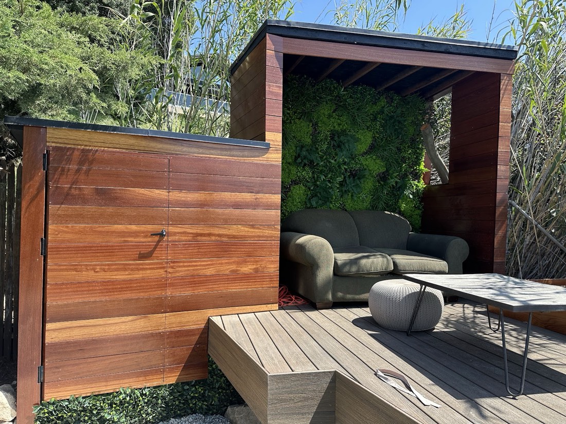 Green wall inside a backyard cabana